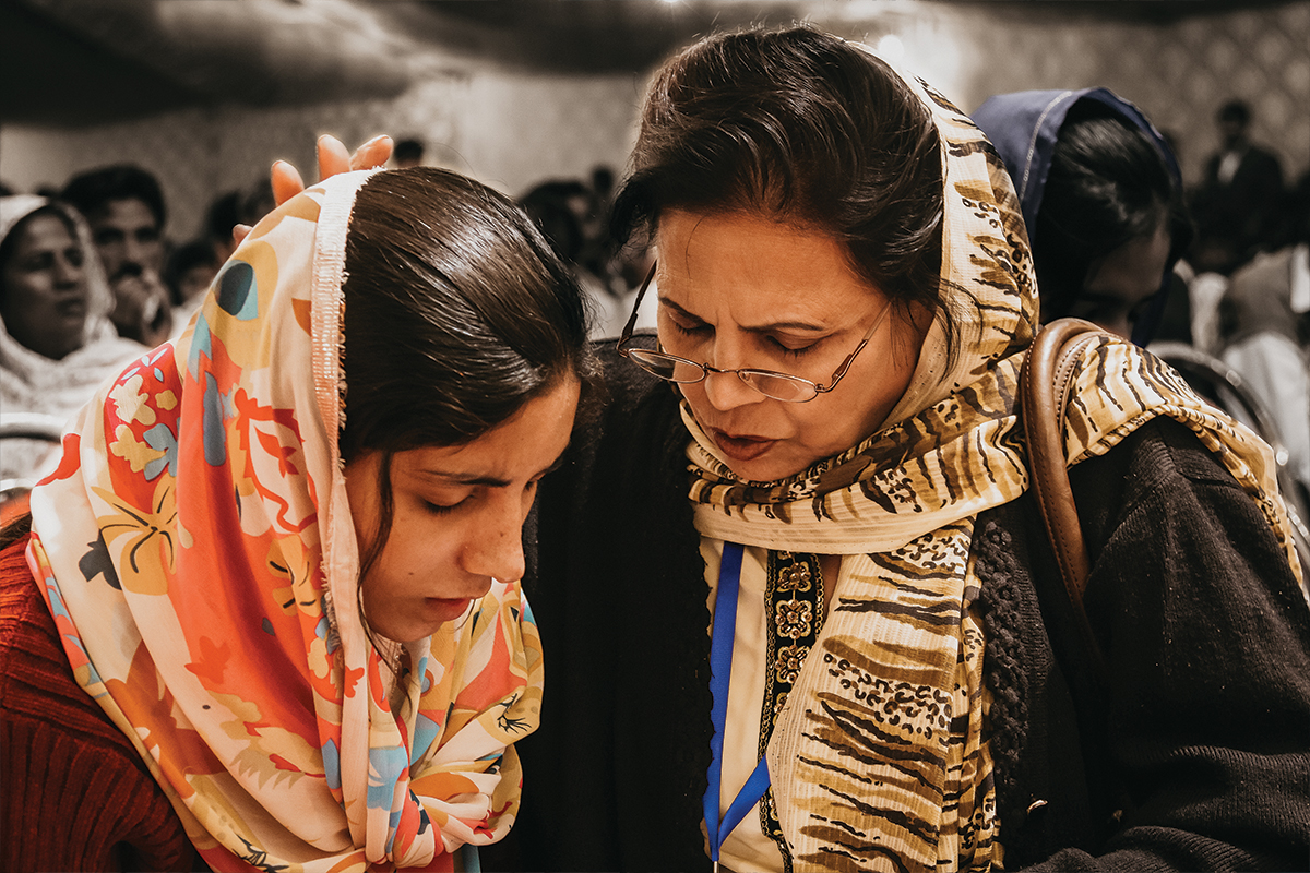 Two women praying